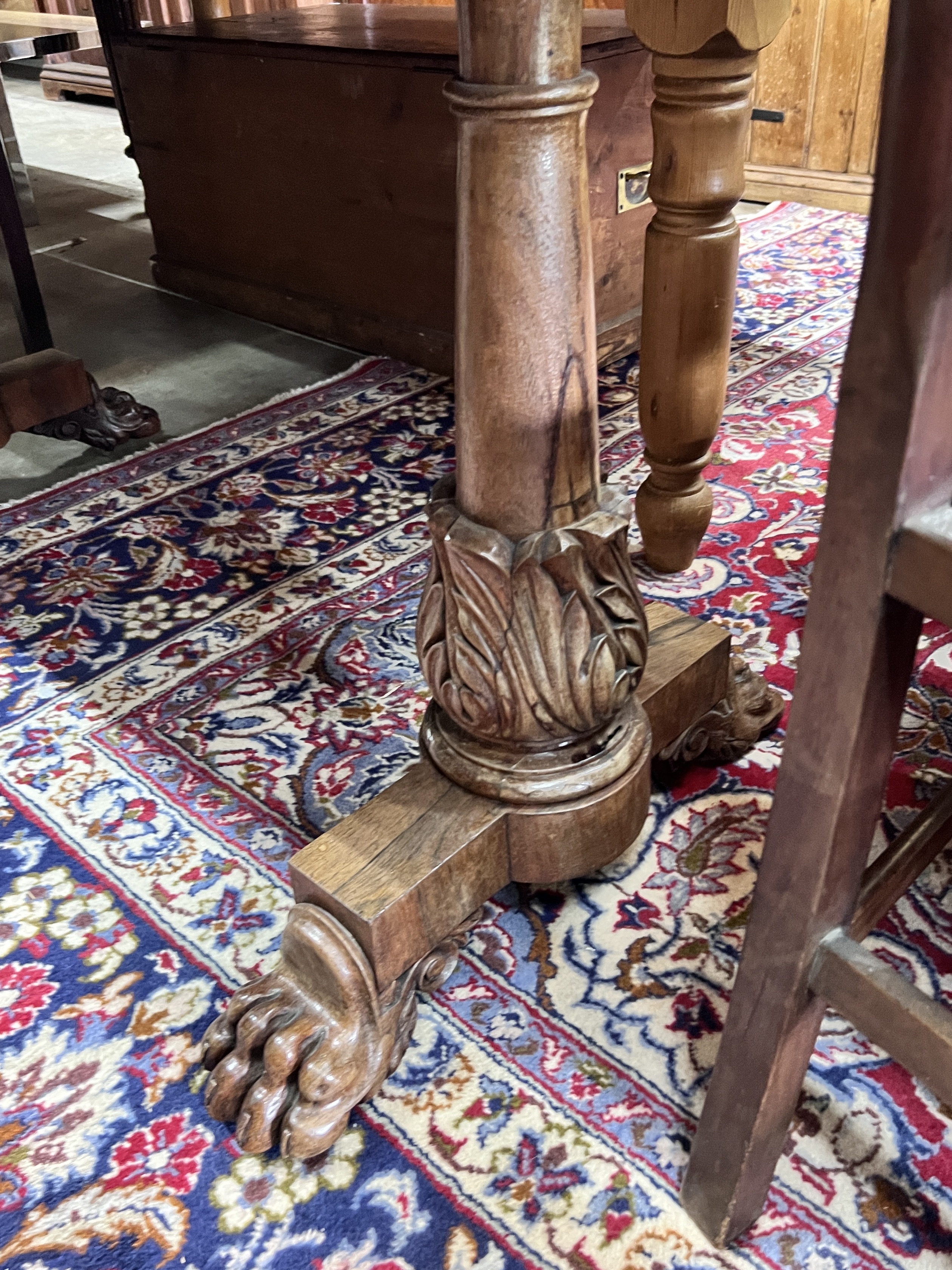 A Victorian rosewood two drawer library table, width 143cm, depth 68cm, height 77cm